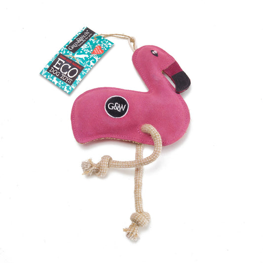 A pink suede toy in the shape of a flamingo with natural jute rope legs, branded with 'G&W' on the rear. The toy has tags indicating it is an eco-toy.